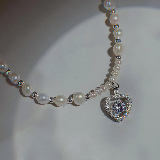 Coeur battant de perles élégantes françaises